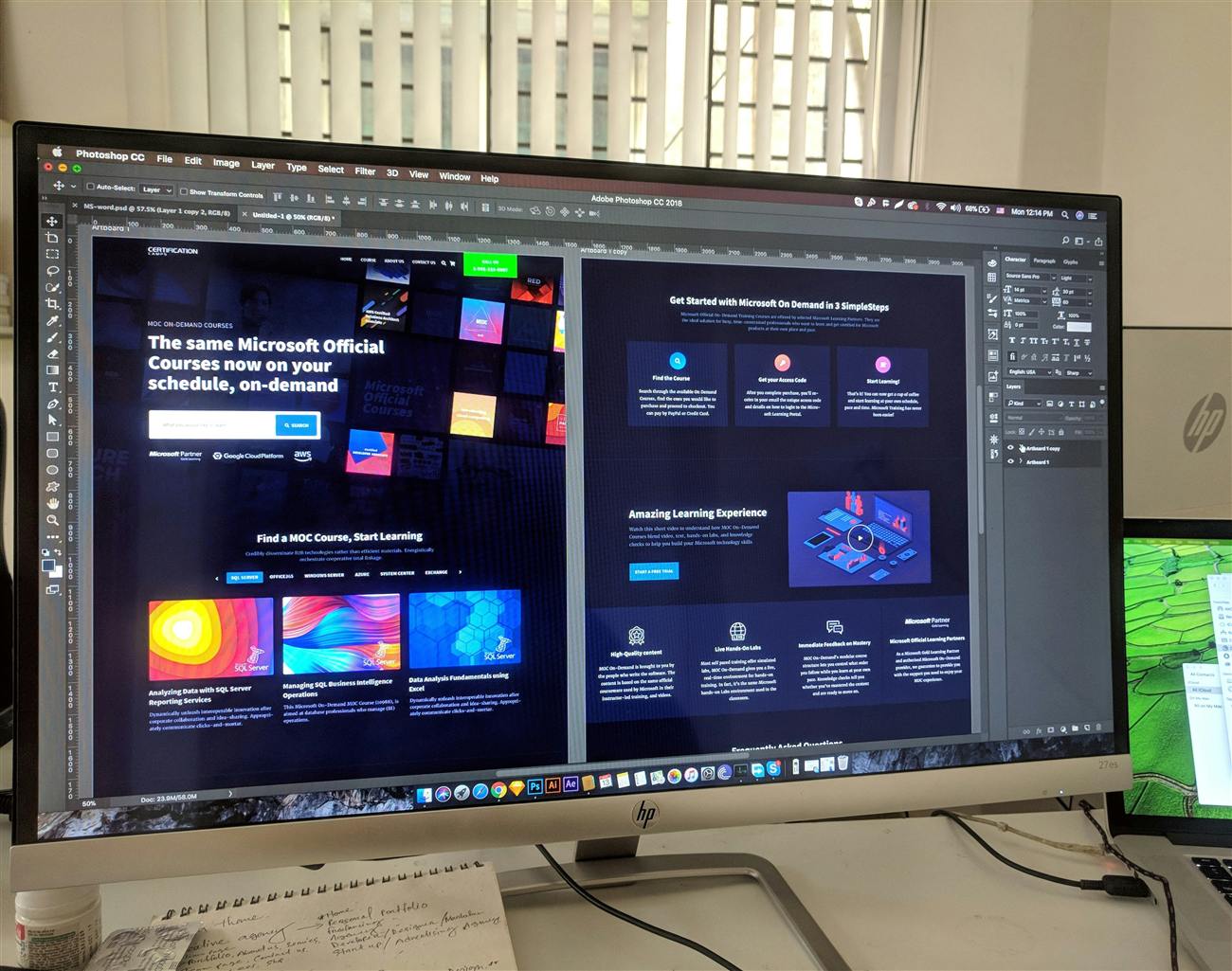 Website interface designs laid out side by side on a desktop monitor